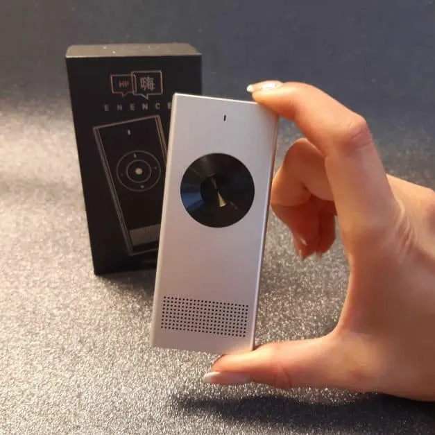 Enence portable language translator device